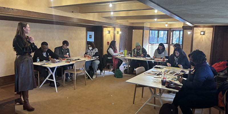 Teachers work on architectural footprints and floorplans in a hands-on workshop led by a Trust Educator.